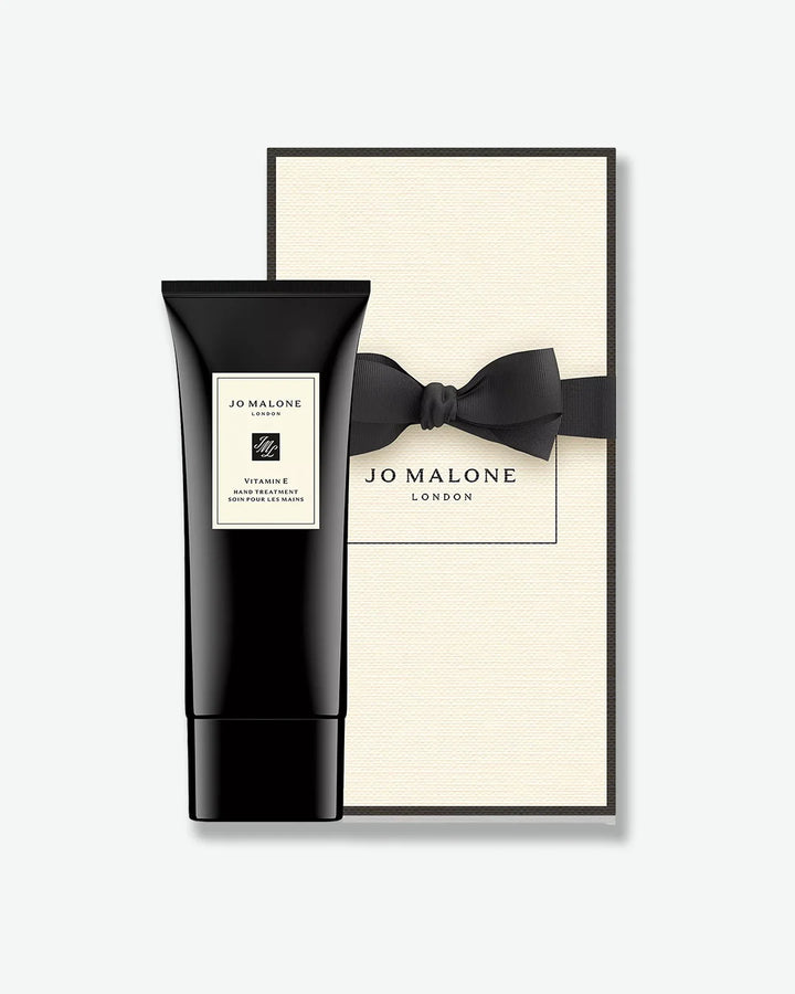 Jo Malone hand cream with a matching black box on a white background