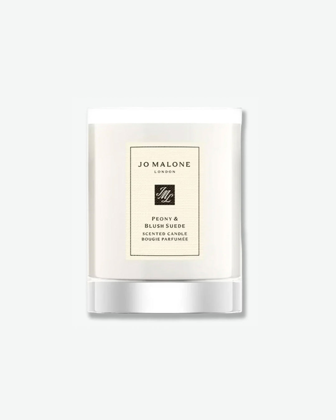 Jo Malone candle with white label on a light gray background