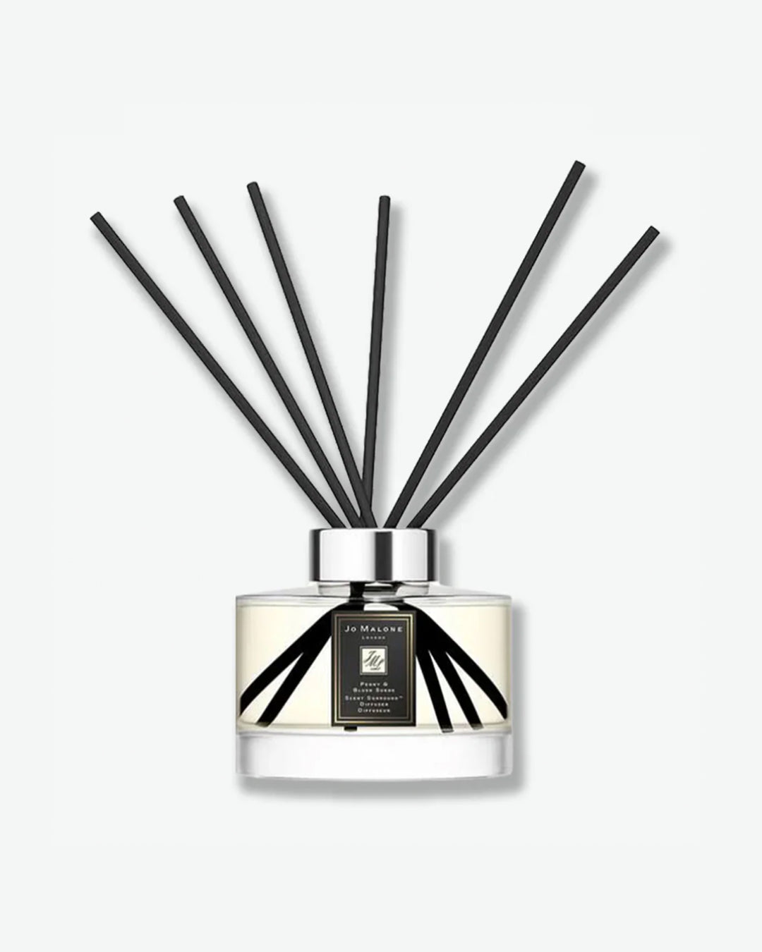 Diffuser with black sticks on a white background