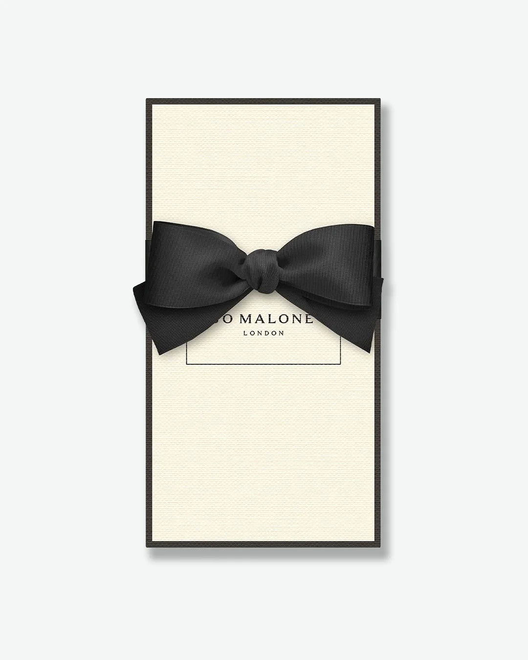 Signature Jo Malone London cream colored gift box with a black ribbon on a white background