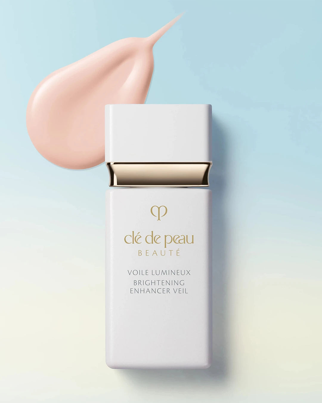 Cle de Peau skincare product with a smear of cream on a gradient background