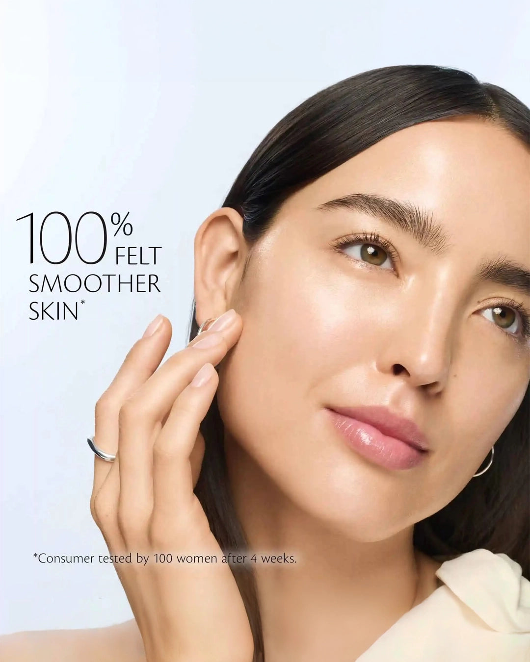 Woman touching her face with a light blue background and text about smoother skin.