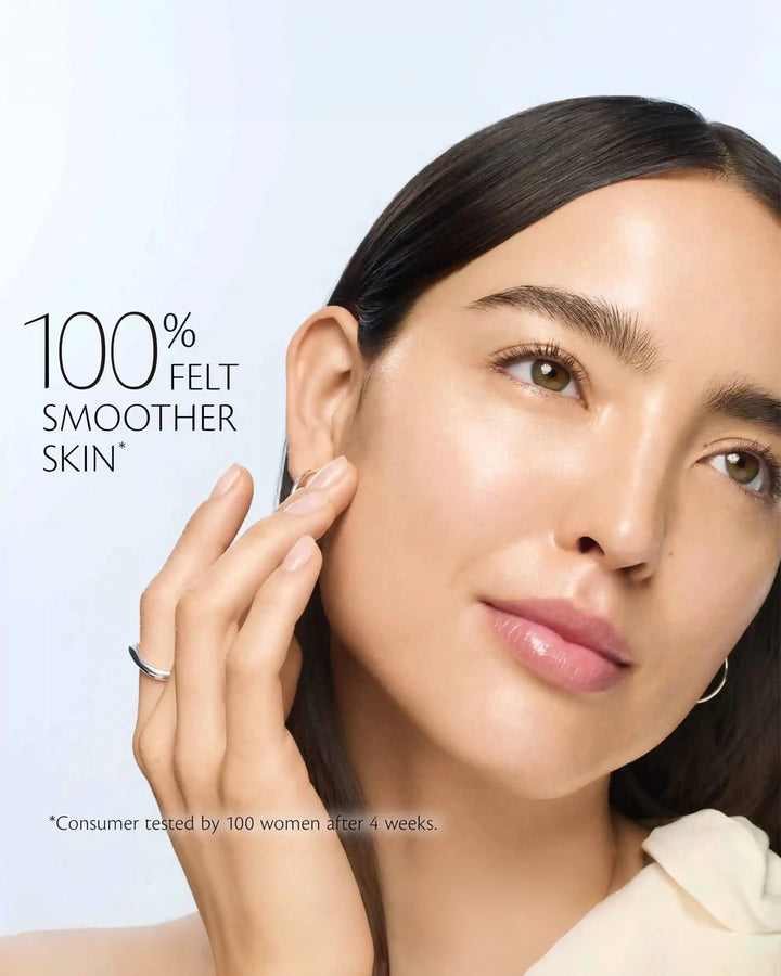 Woman touching her face with a light blue background and text about smoother skin.