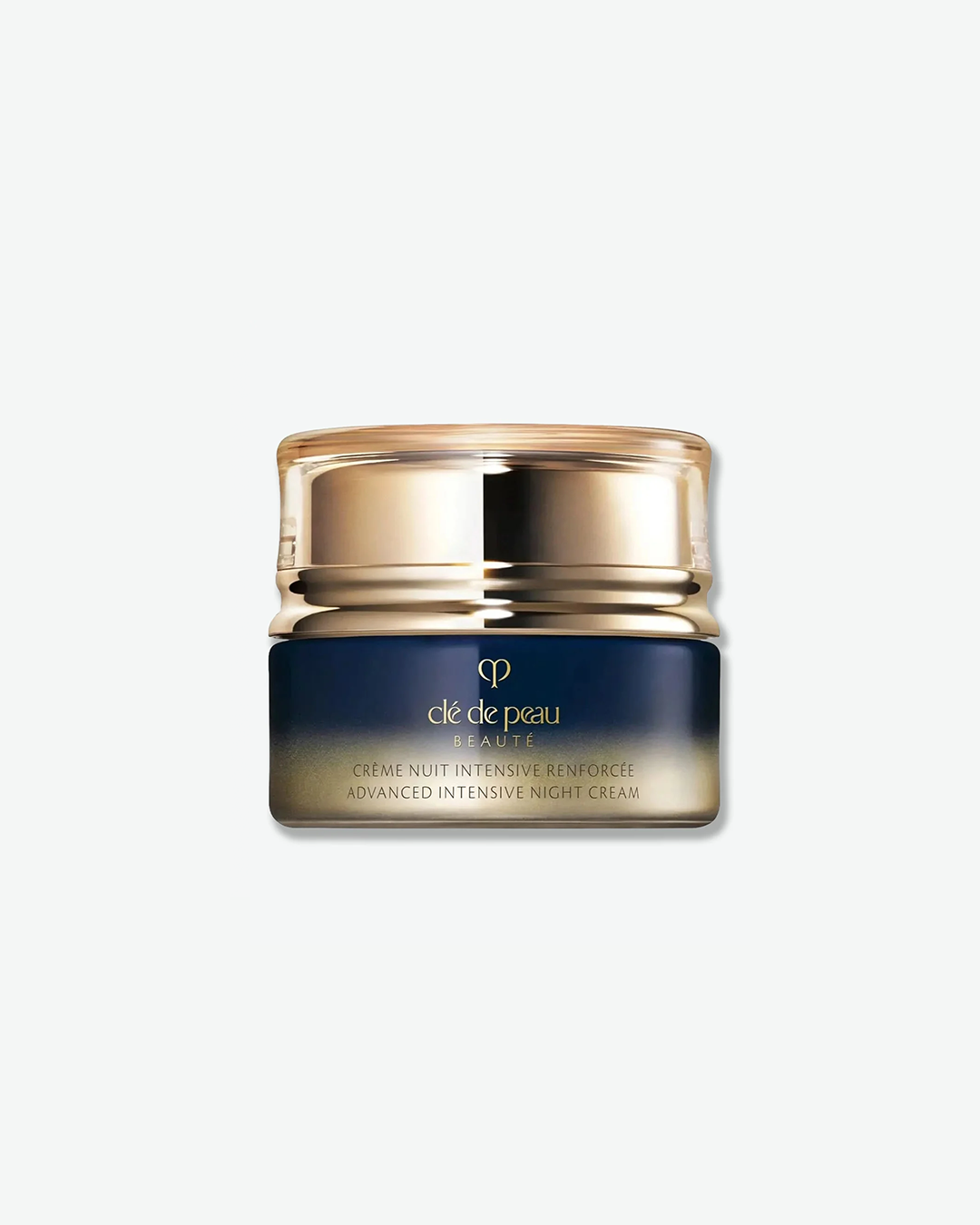 Clé de Peau Beauté Advanced Intensive Night Cream in a luxurious deep blue jar with a striking metallic gold base gradient and matching gold lid.