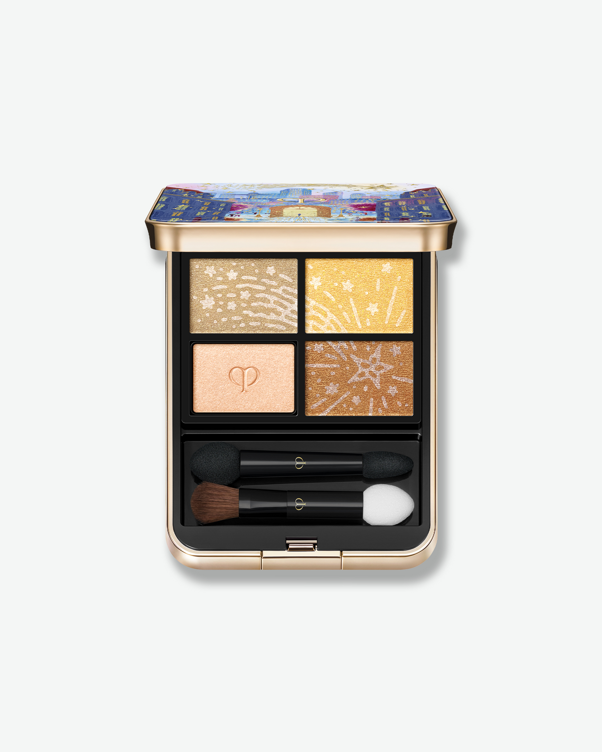 Clé de Peau Beauté limited-edition holiday eyeshadow palette featuring four shimmering shades in gold, champagne, peach, and bronze, with two applicators.