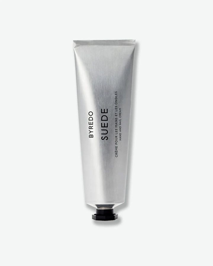 Aluminum Byredo Suede hand cream tube on a white background