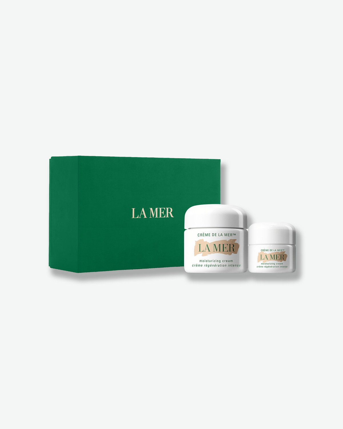 La Mer Crème de la Mer set featuring two moisturizing cream jars alongside a signature green La Mer gift box.