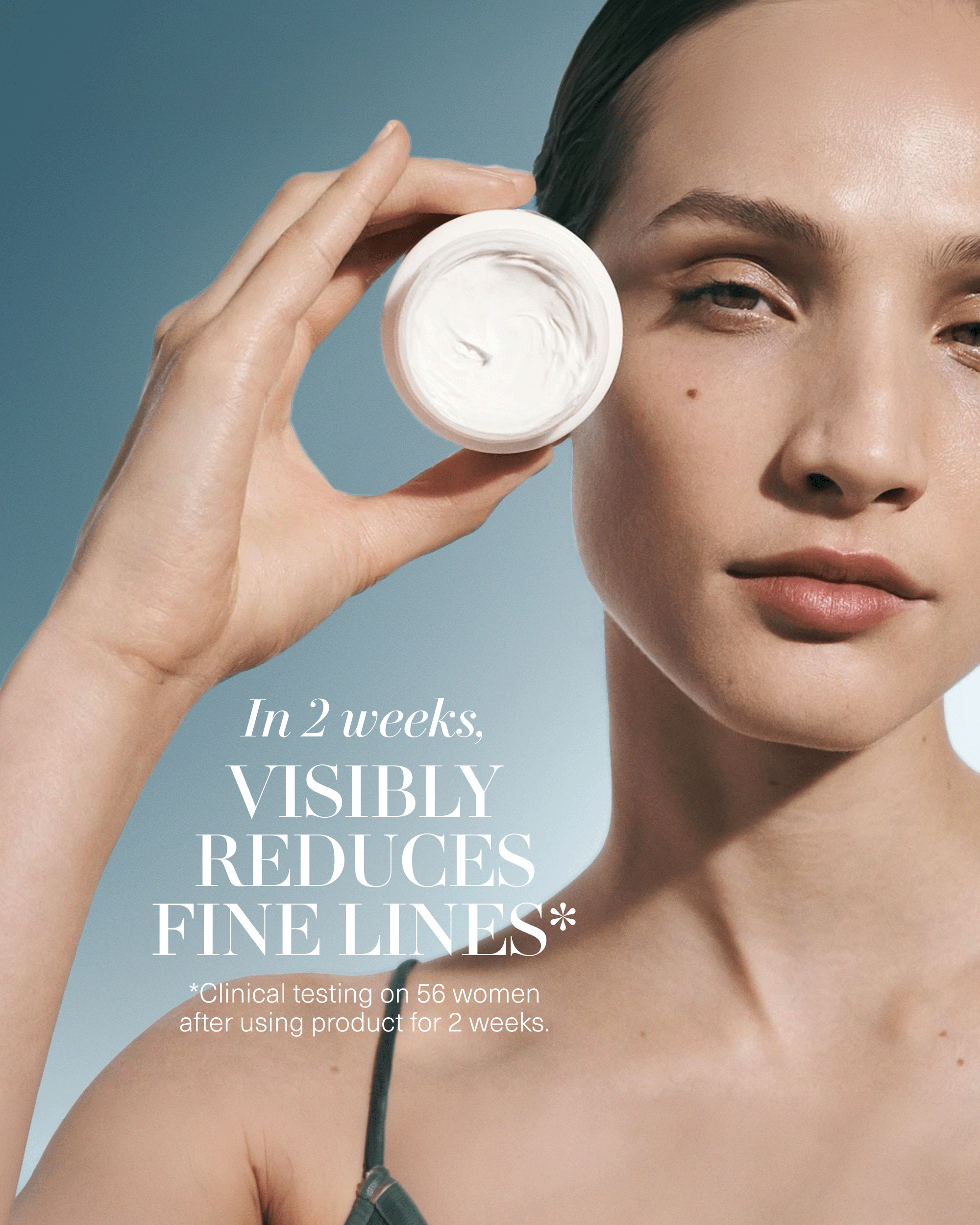 Model holding an open jar of Crème de la Mer with text highlighting visibly reduced fine lines in two weeks.