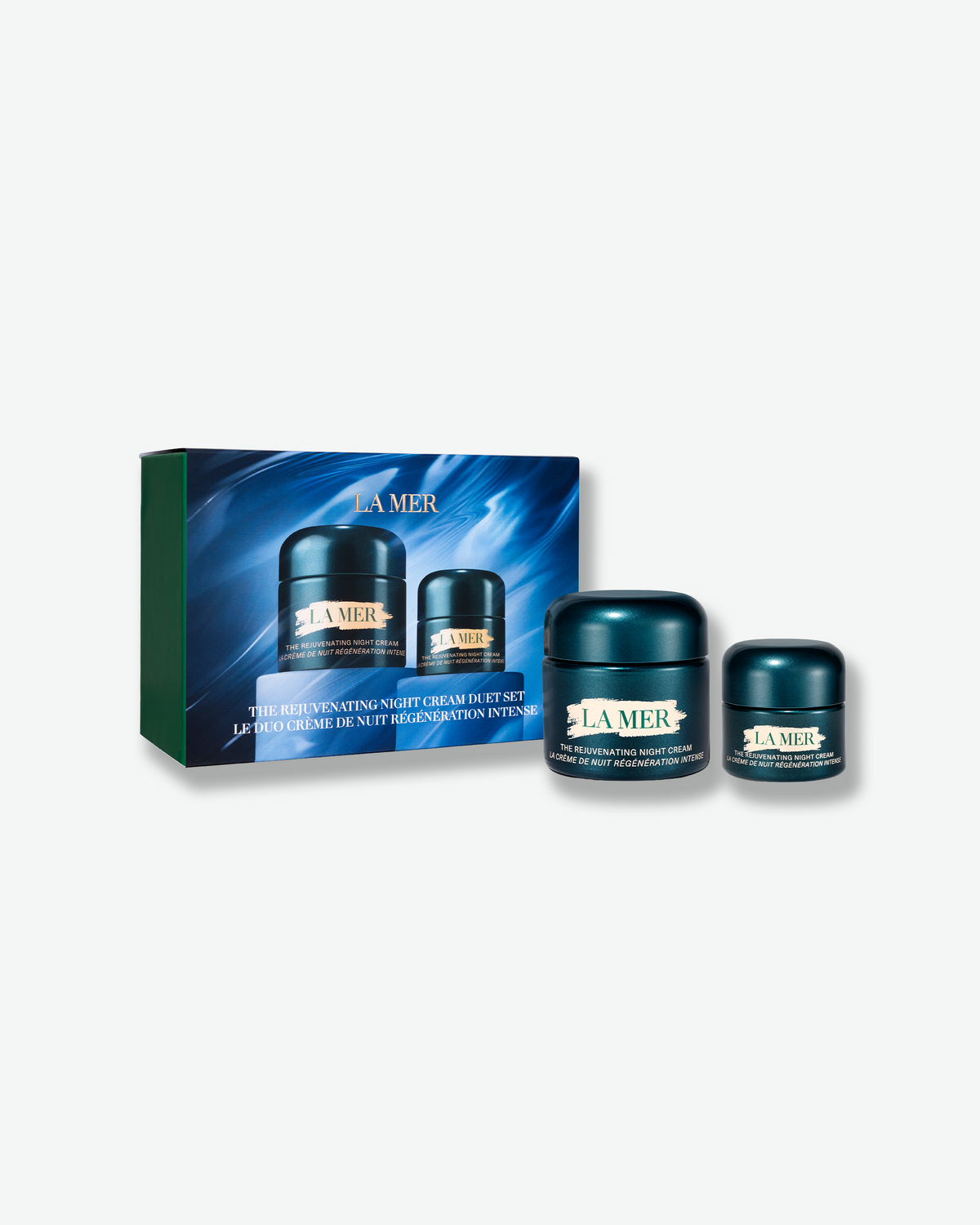 La Mer The Rejuvenating Night Cream Duet Set with two dark teal cream jars displayed beside the coordinating blue gift box.