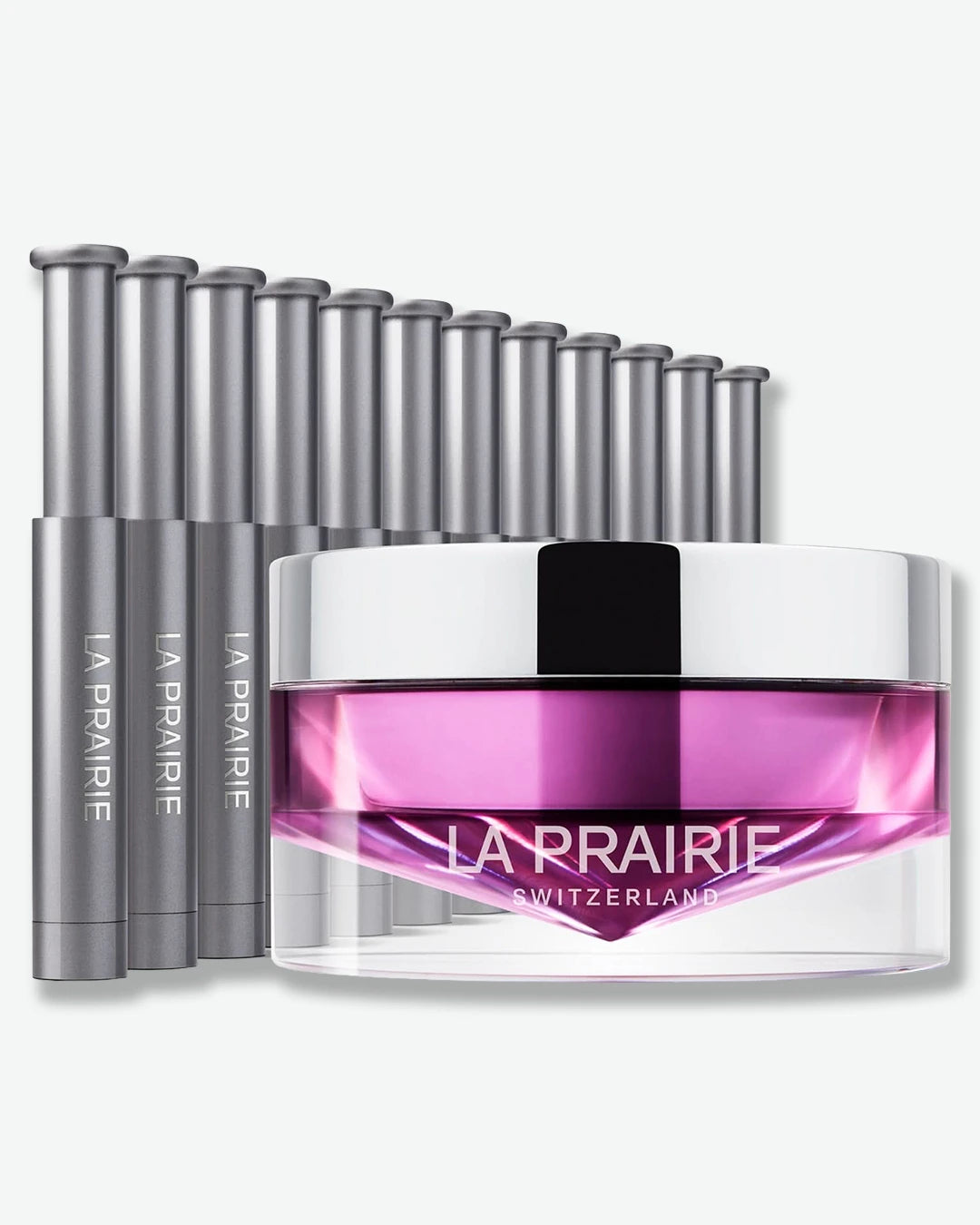 La Prairie skincare products including a jar and applicators on a white background