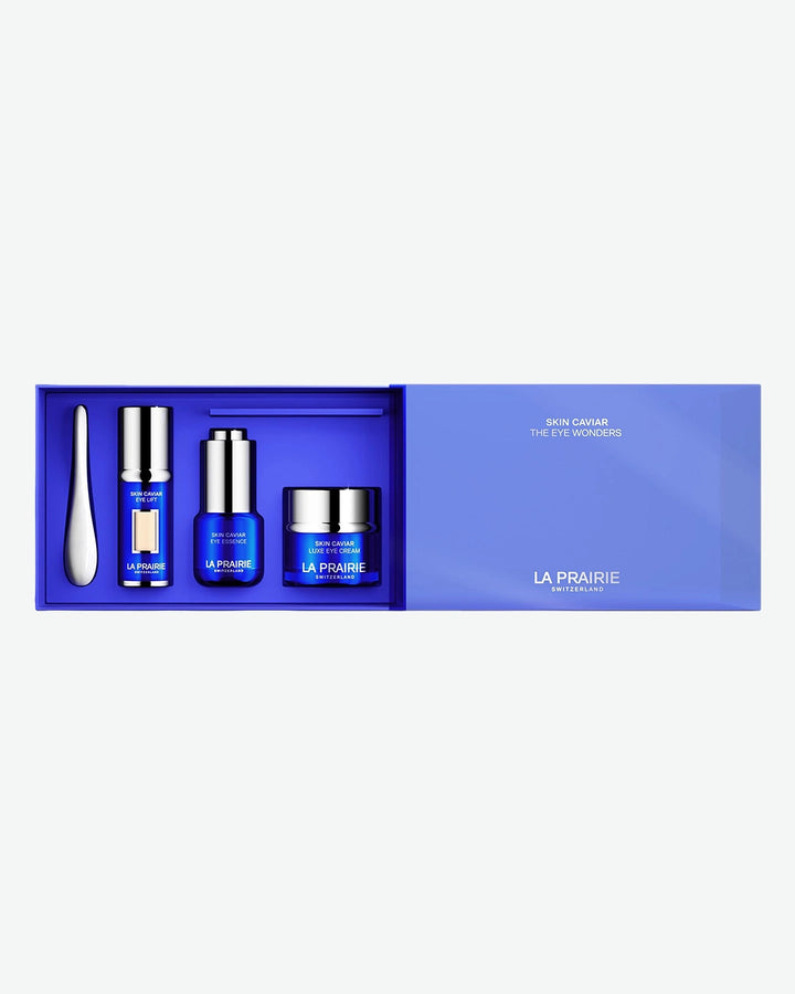 La Prairie Skin Caviar The Eye Wonders gift set, displayed inside a vibrant cobalt blue presentation box with a sliding outer sleeve.