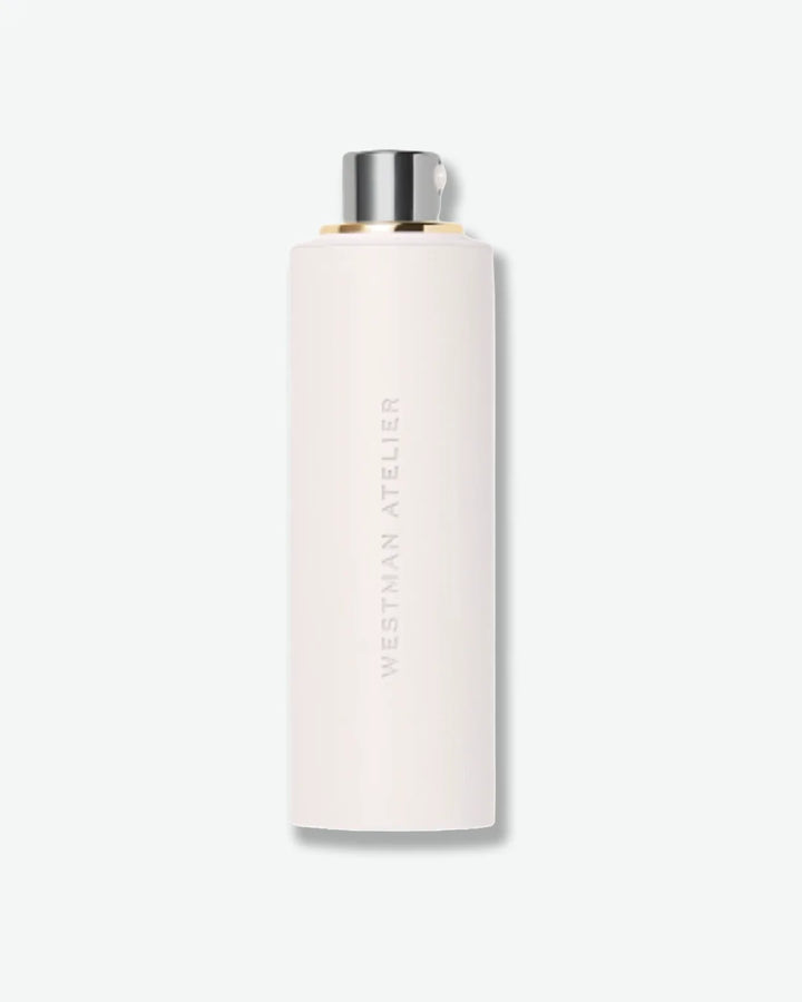 White cylindrical bottle with silver cap on a white background