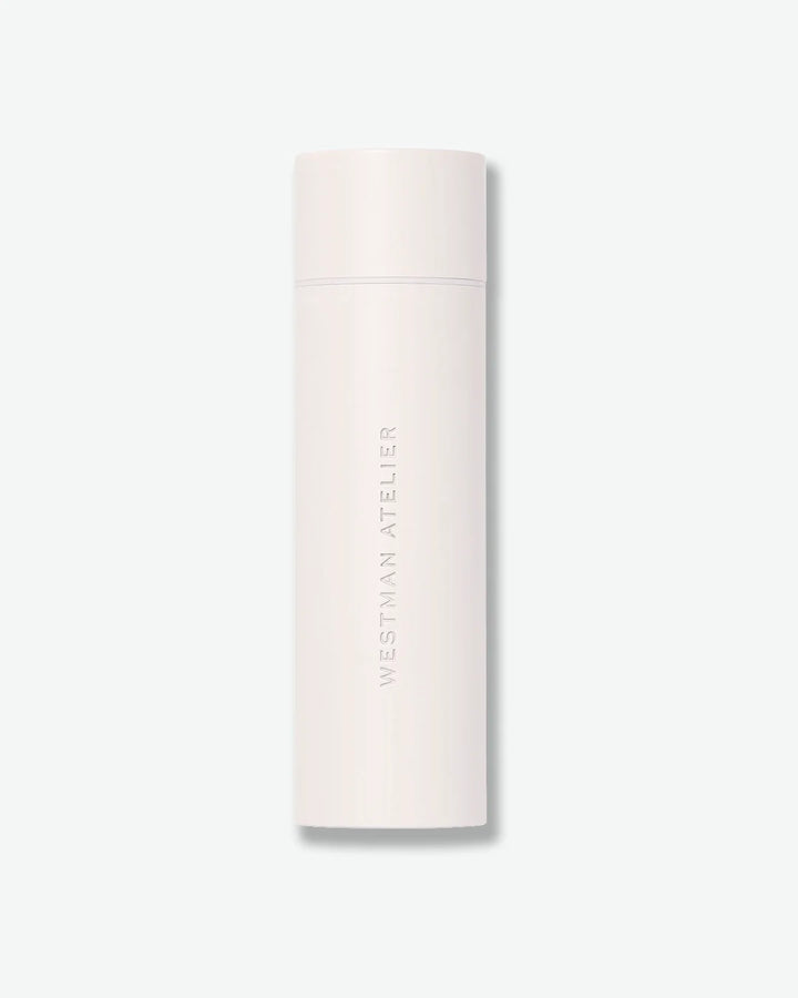 White cylindrical container with 'Westman Atelier' branding on a light gray background