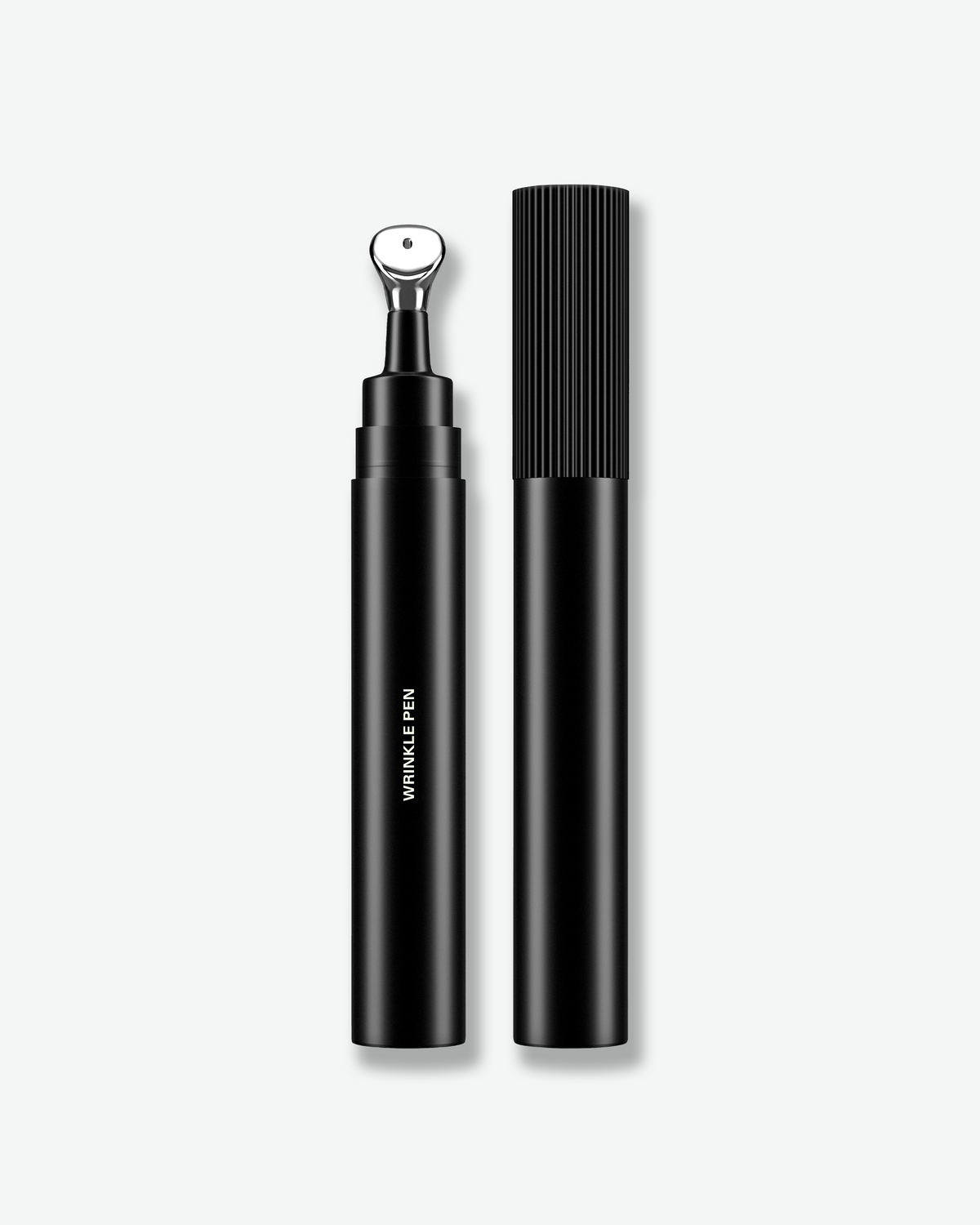 Dr. Marnie Wrinkle Pen shown open with cap and cooling metal applicator tip.