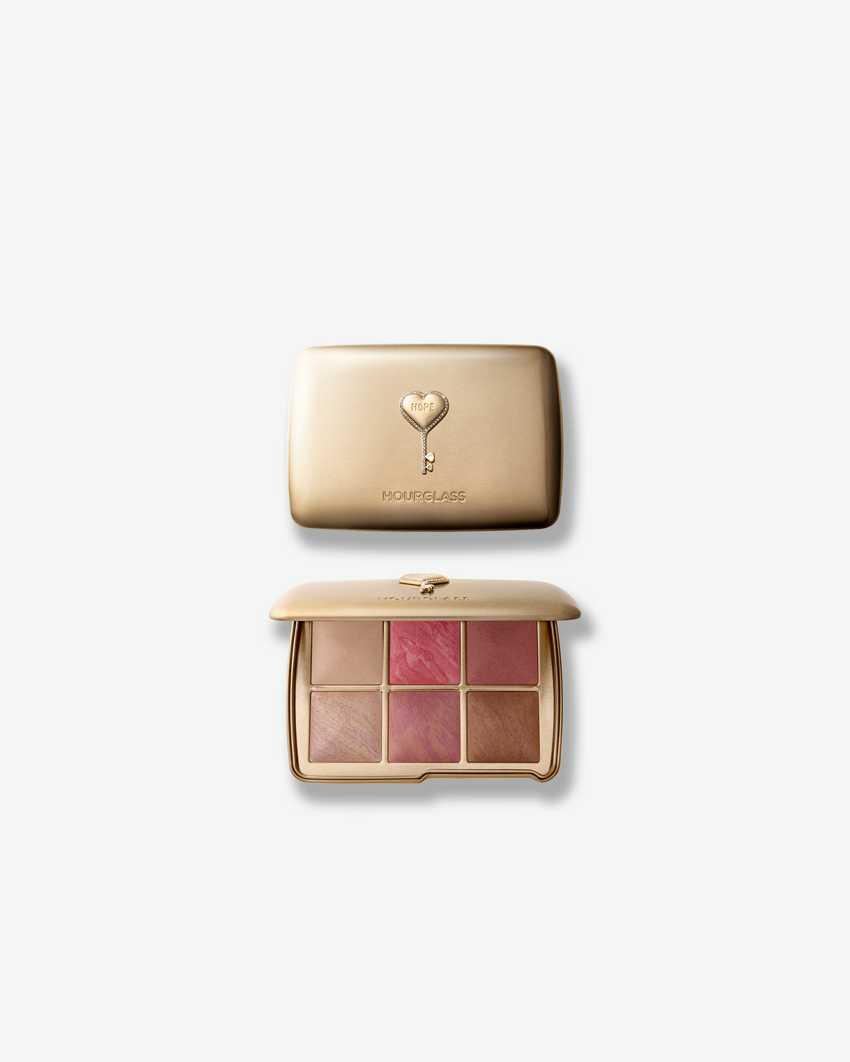 Hourglass Ambient Lighting Edit – Unlocked Palette in Hope, shown closed and open with six face powders in soft pink, rose, champagne, and bronze tones.