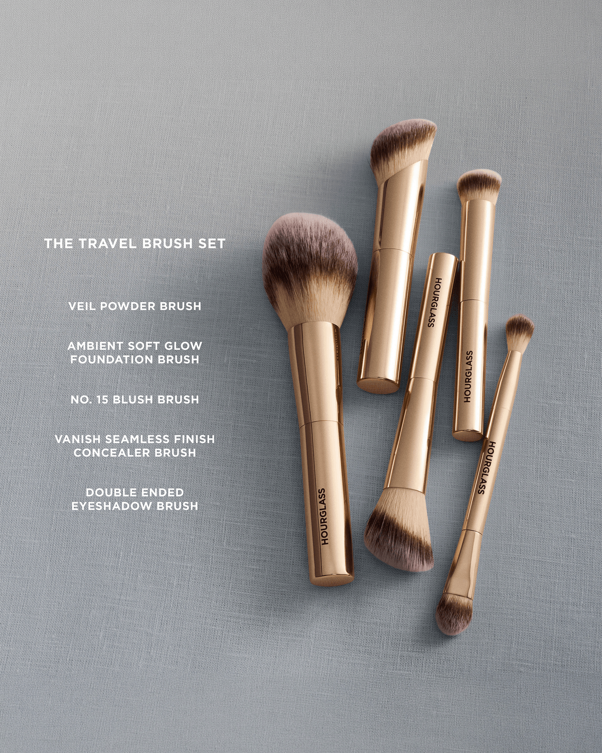 Hourglass Travel Brush Set assortment showcasing the Veil Powder Brush, Ambient Soft Glow Foundation Brush, No. 15 Blush Brush, Vanish Seamless Finish Concealer Brush, and Double-Ended Eyeshadow Brush.