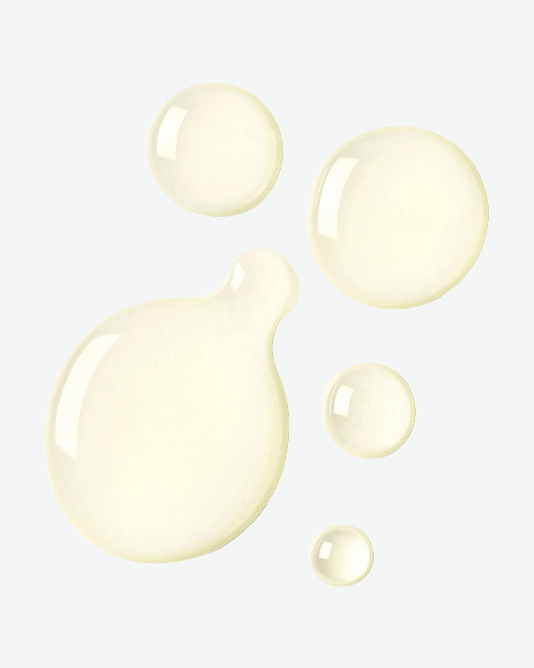 Cream-colored bubbles on a light gray background