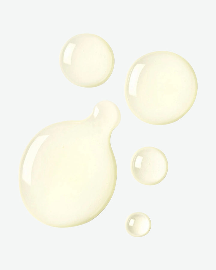 Cream-colored bubbles on a light gray background