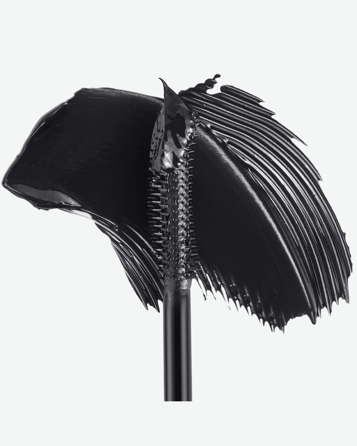 Black makeup brush with bristle head on a white background