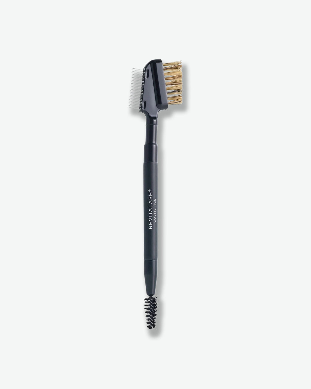 Eyebrow brush with bristle and wooden handle on a white background