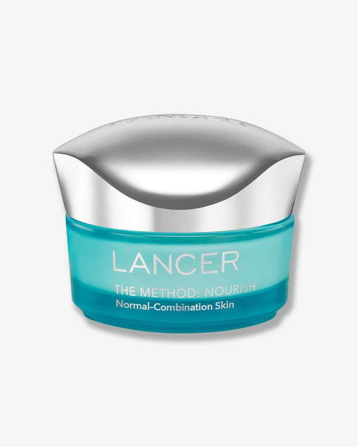 Lancer skincare product with blue jar and silver lid on a light gray background