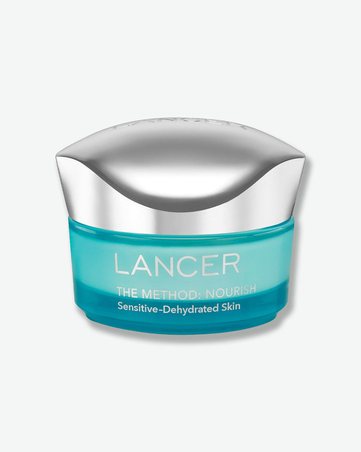Lancer skincare product with blue jar and silver lid on a light gray background