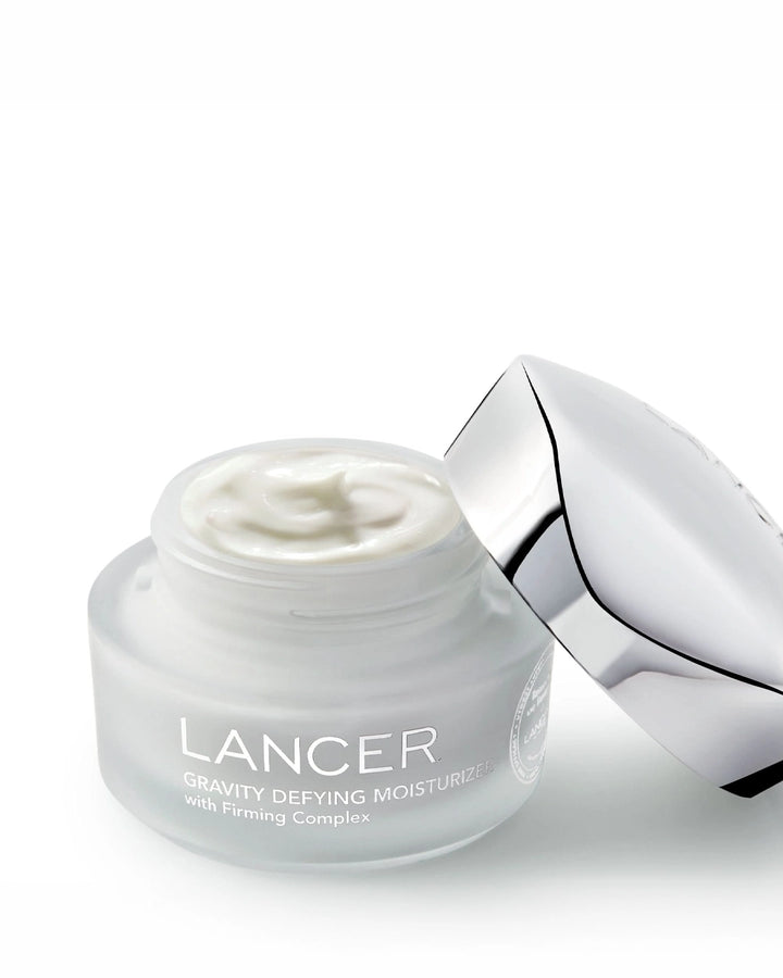 Lancer skincare product with jar and cap on a white background