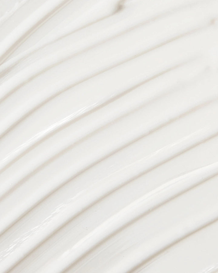 Close-up of white cream with horizontal lines