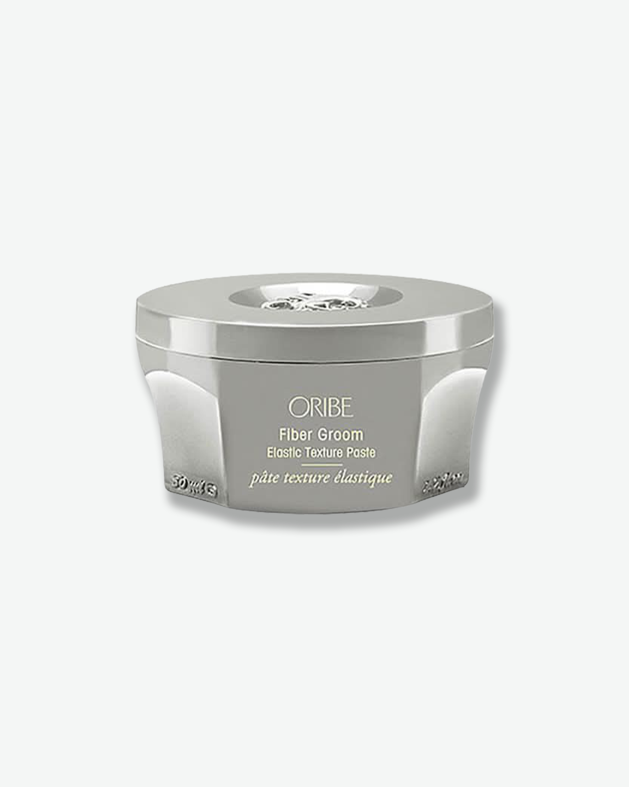 Oribe Fiber Groom jar on a white background