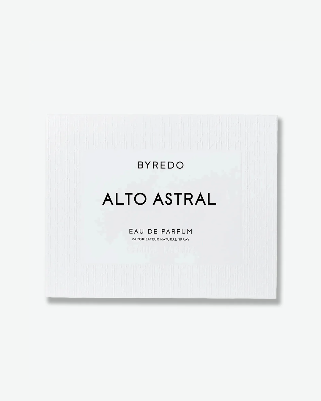 A textured white paper box for Byredo's "Alto Astral" Eau de Parfum, shown lying flat against a light grey background. A central white label on the box features the brand name "BYREDO", the fragrance name "ALTO ASTRAL" in large black lettering, and "EAU DE PARFUM / VAPORISATEUR NATURAL SPRAY" in smaller text below it.