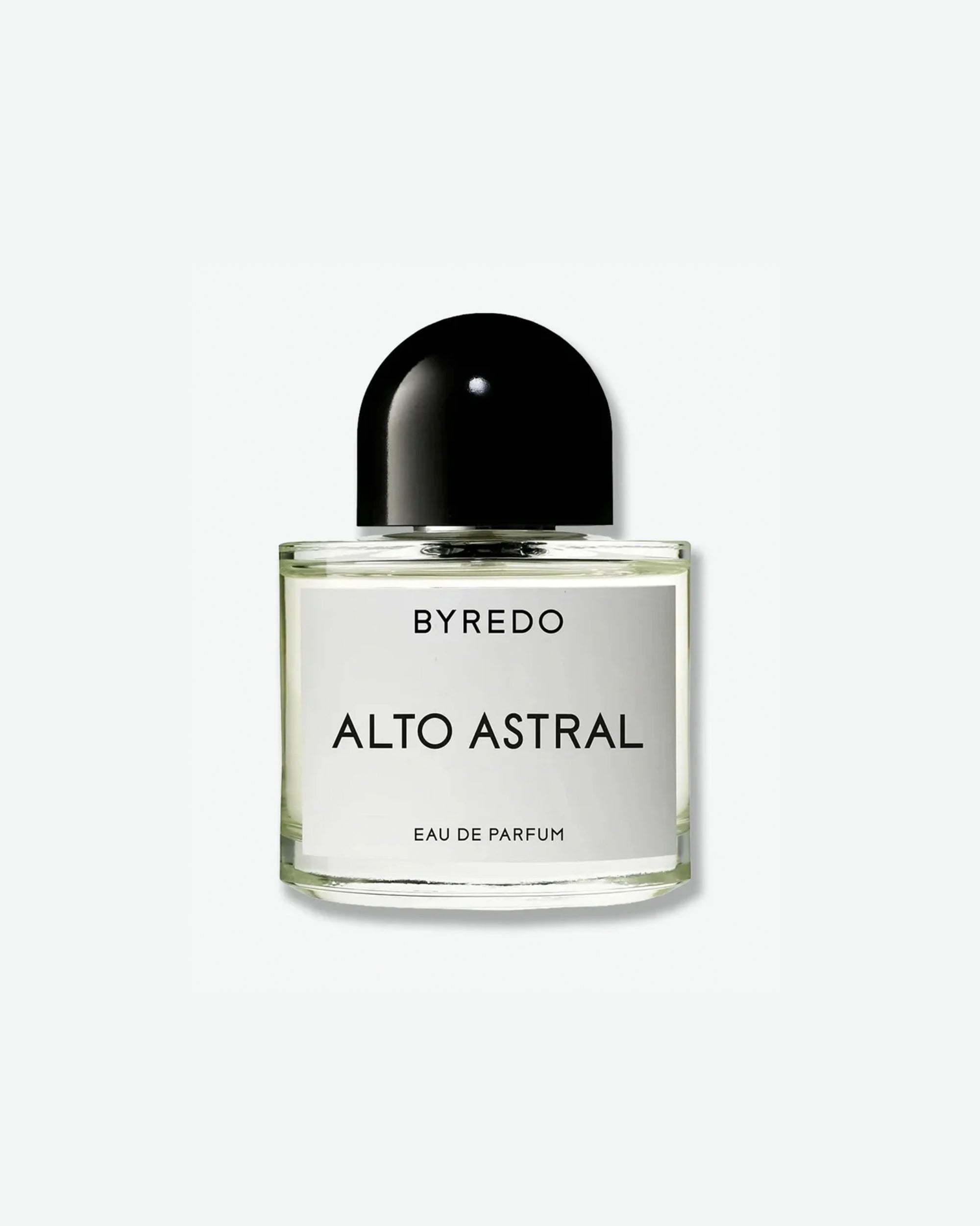 A minimalist, clear glass perfume bottle from Byredo, featuring a glossy, dome-shaped black cap. The rectangular white label reads "BYREDO" at the top, "ALTO ASTRAL" in large black lettering in the center, and "EAU DE PARFUM" in smaller text at the bottom, set against a plain light grey background.