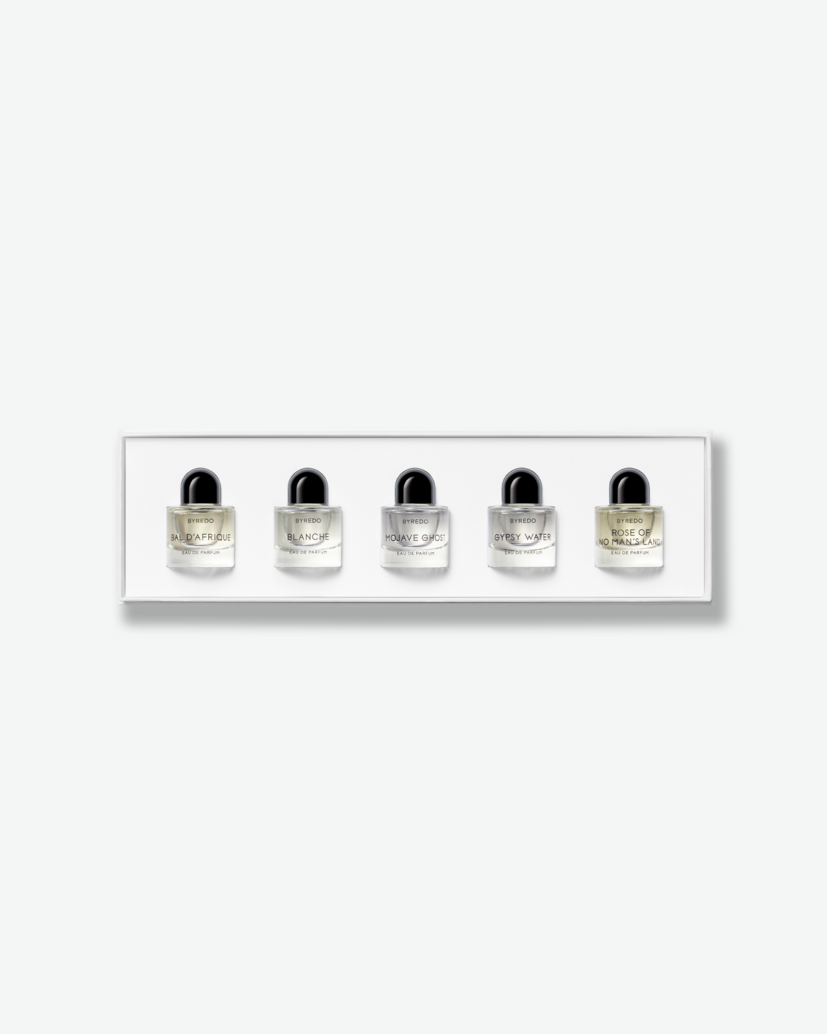 Open Byredo Les Miniatures fragrance set displaying five miniature Eau de Parfum bottles in a white tray.