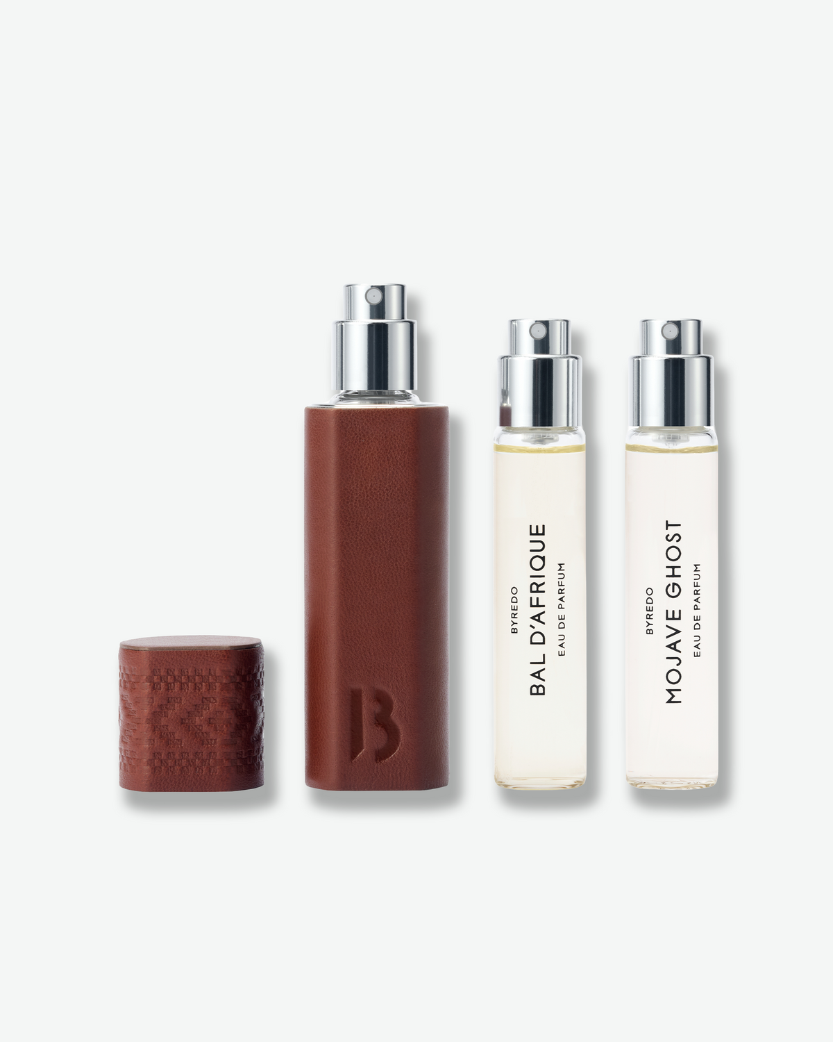Byredo La Sélection Iconique Eau de Parfum set with a brown leather travel case and Bal d’Afrique and Mojave Ghost fragrance refills.