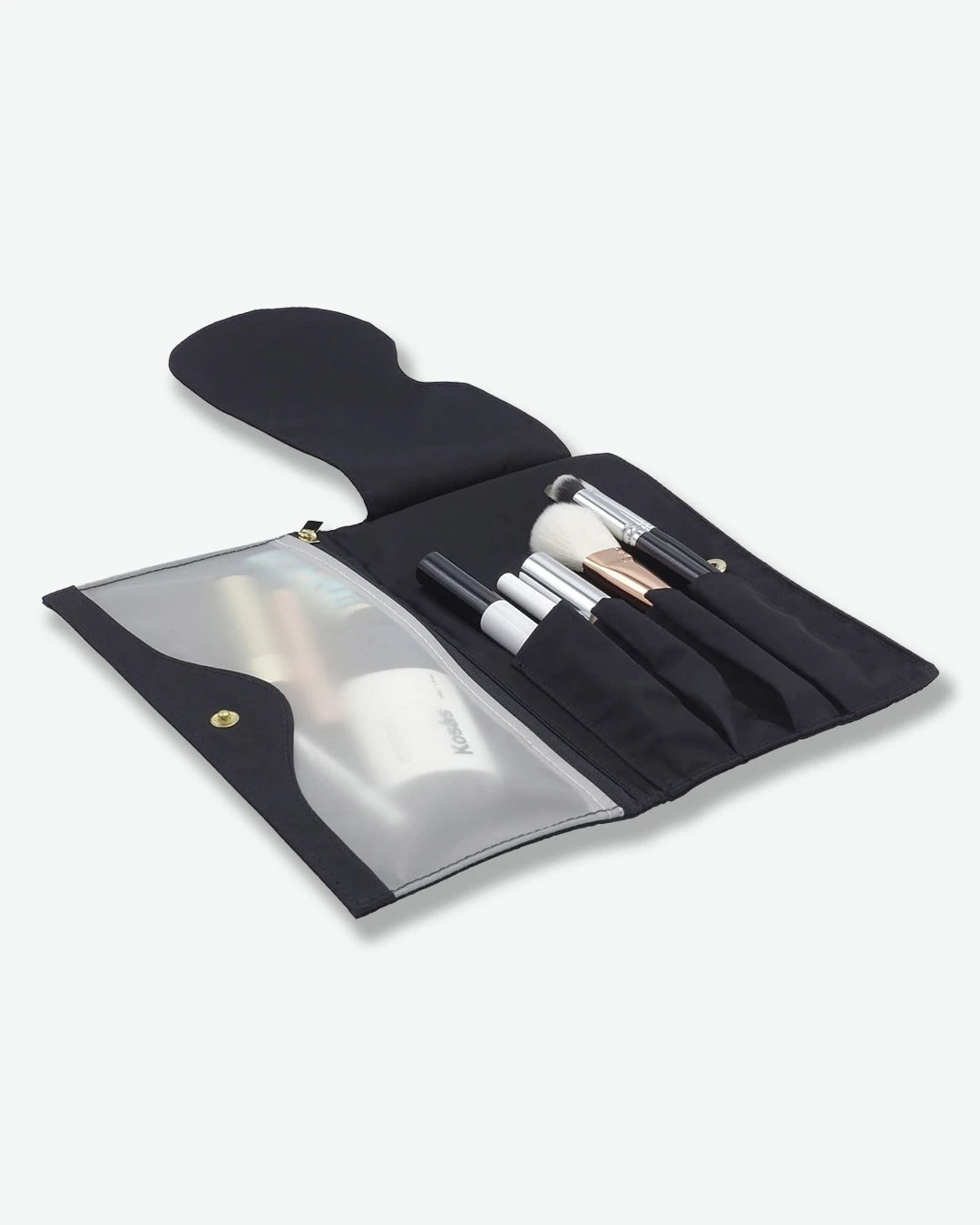 Set of makeup brushes in a black case on a white background