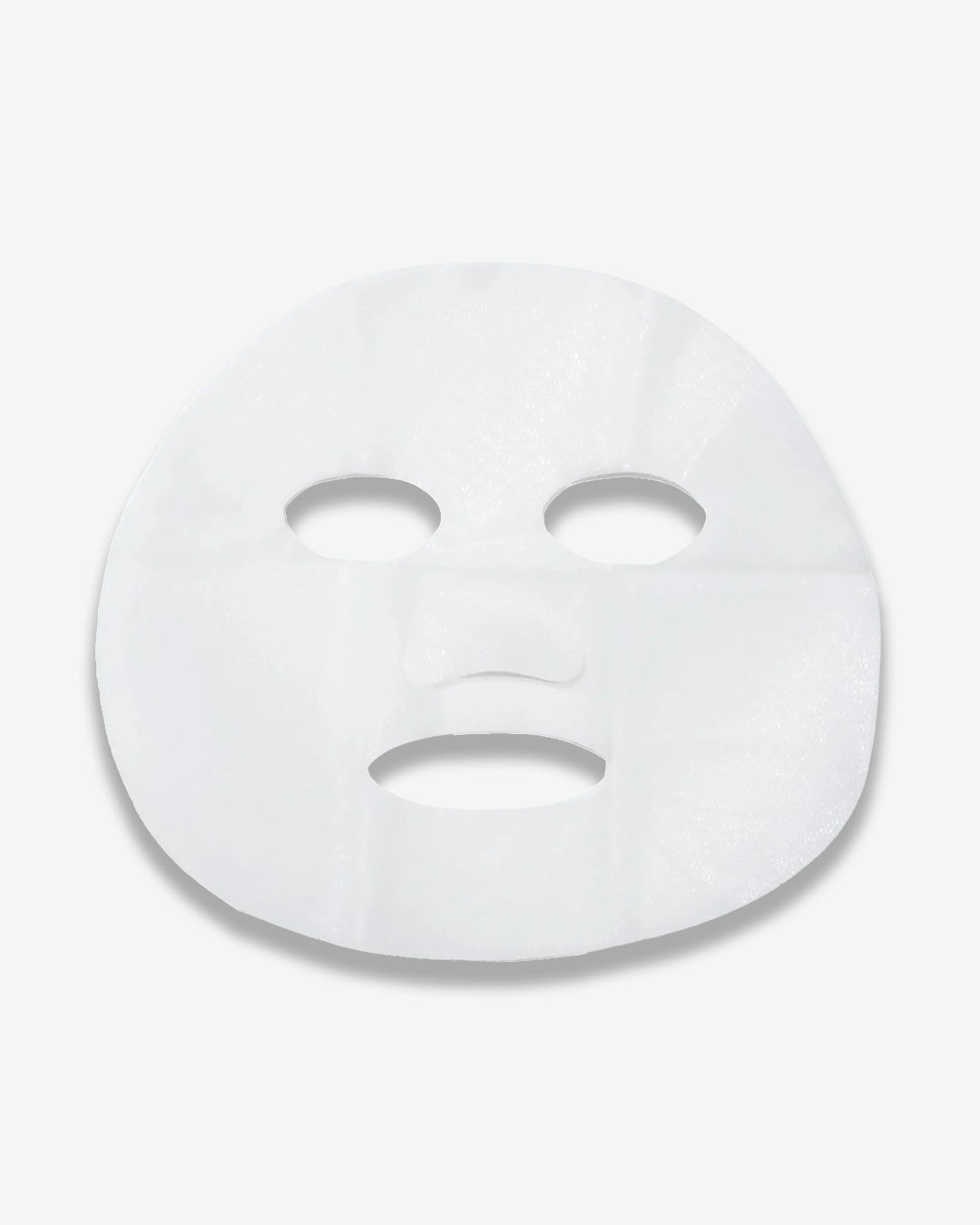 White face mask on a light gray background