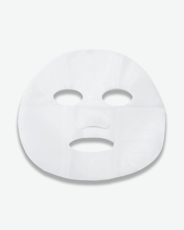 White face mask on a light gray background