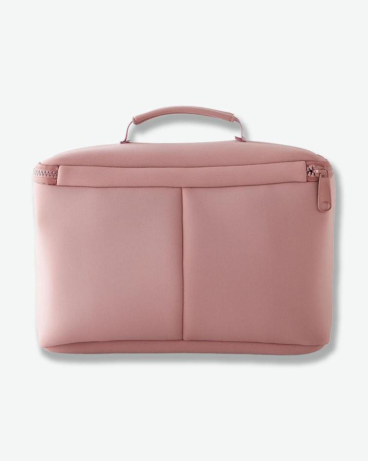 Pink makeup case on a white background