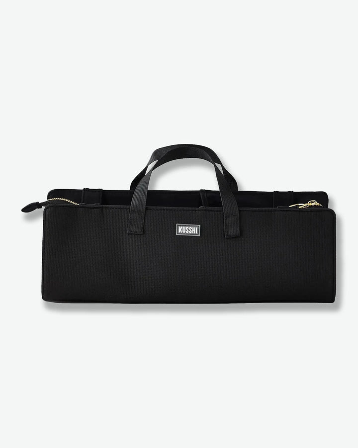 Black carrying case with a handle on a white background