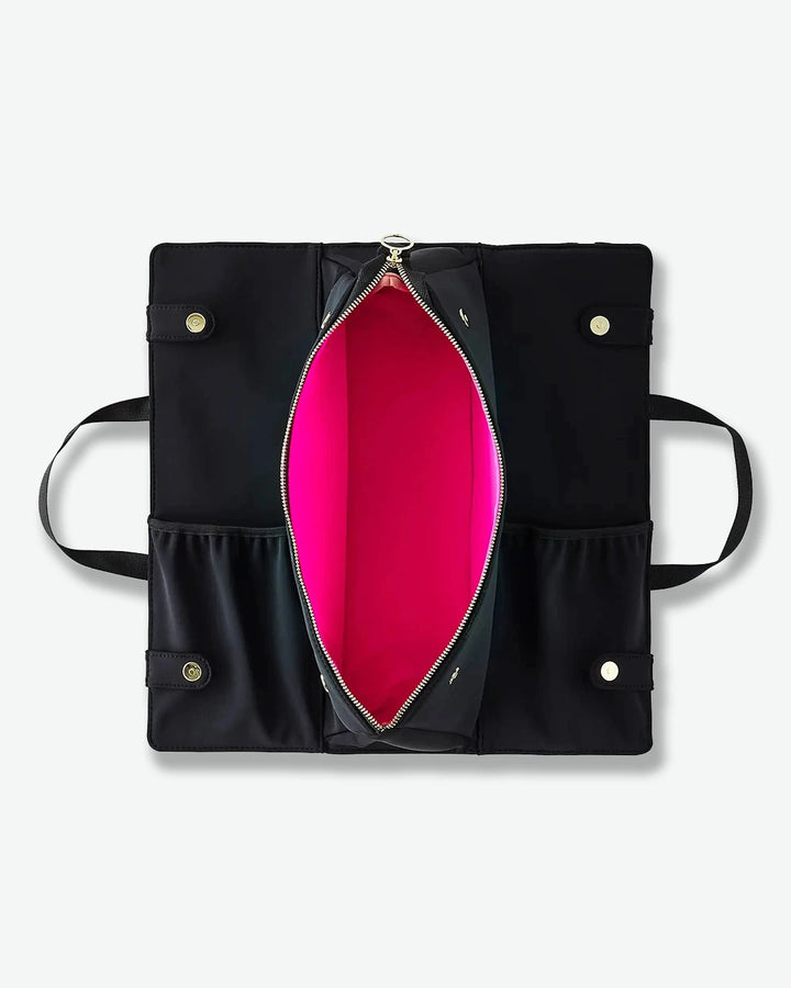 Black bag with a pink interior on a white background
