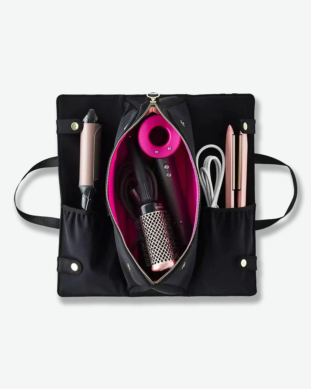 Black carrying case with hair styling tools including a hair dryer, brush, and other accessories on a white background.