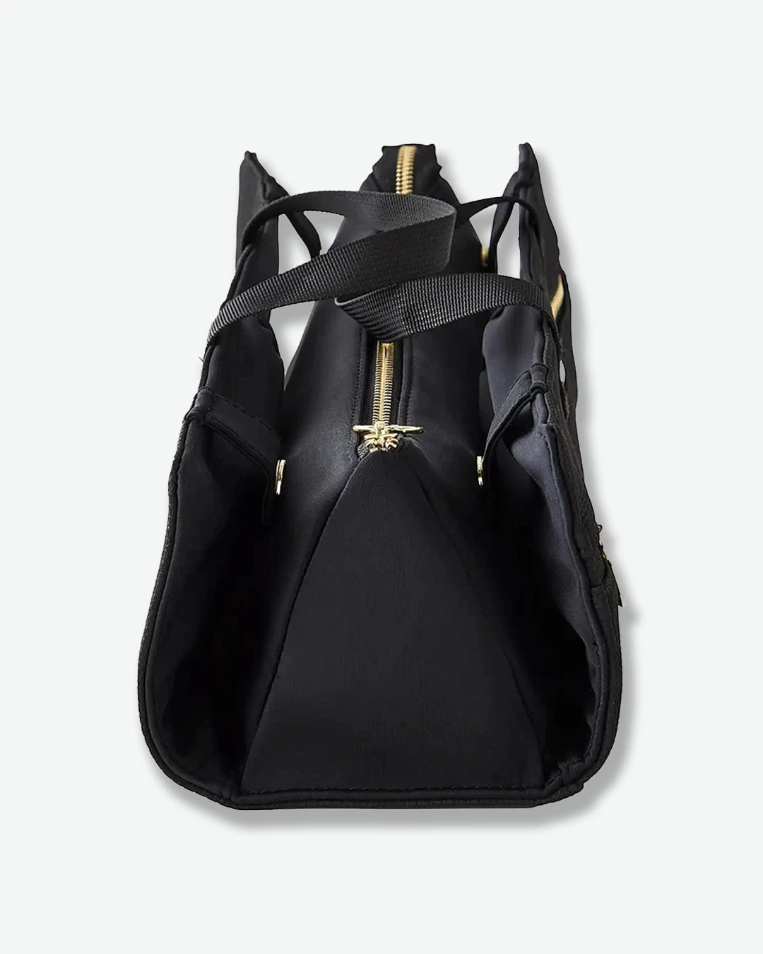 Black backpack with gold zipper on a white background