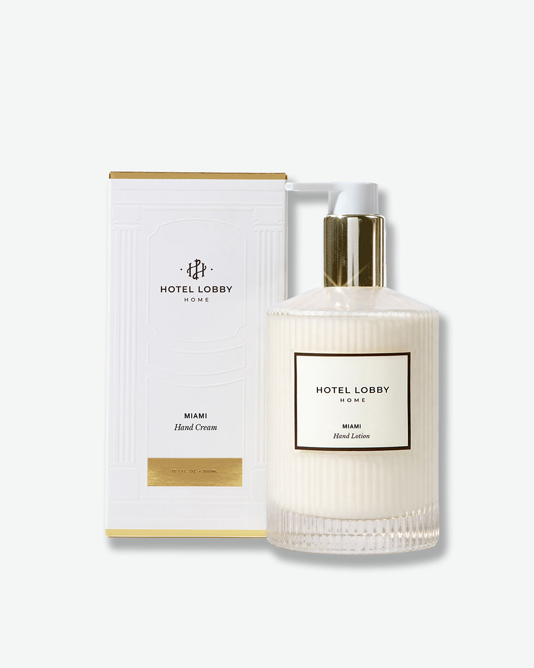 Hand cream bottle and packaging with 'Hotel Lobby Home' branding on a white background