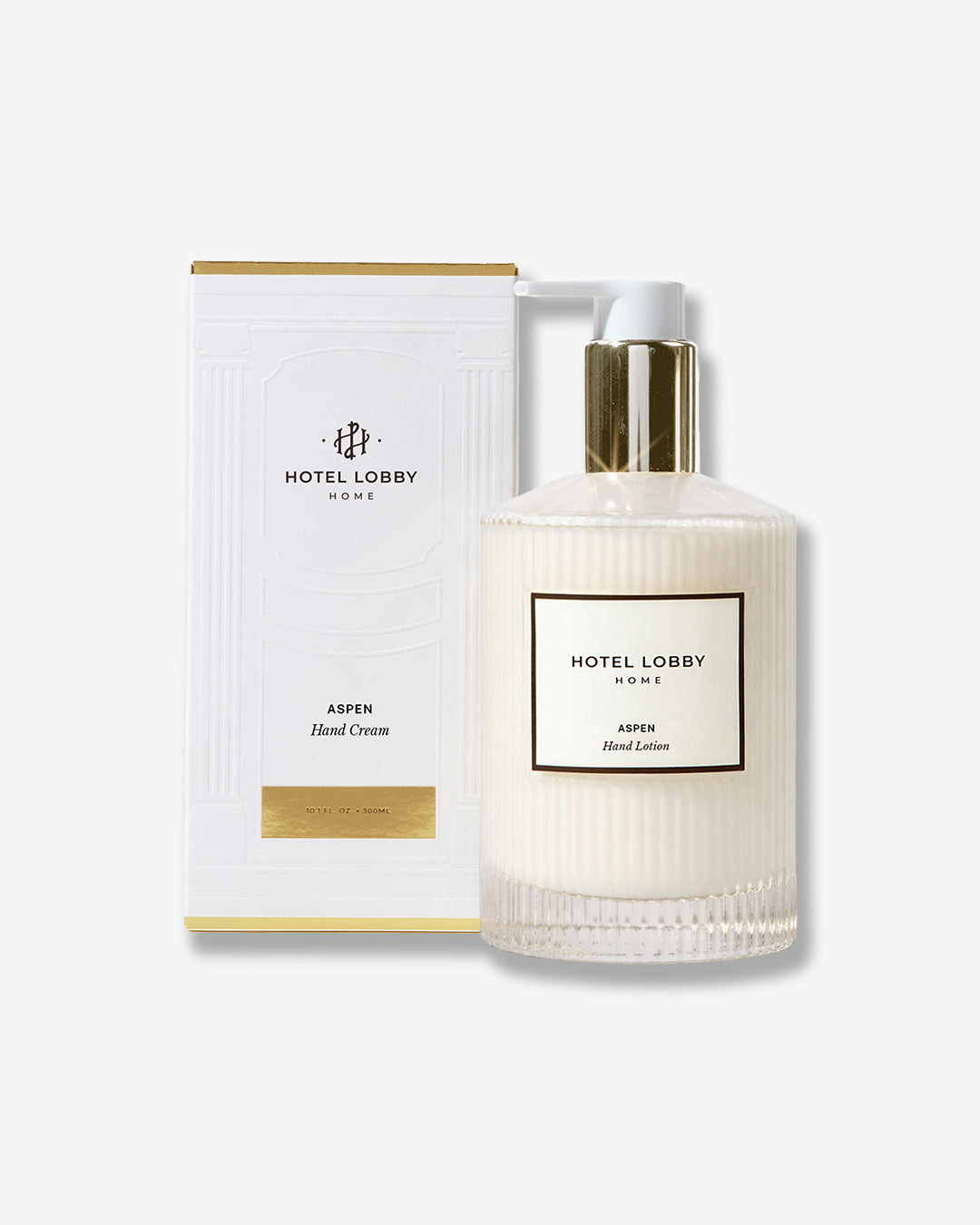 Hand lotion bottle and packaging with 'Hotel Lobby Home' branding on a white background
