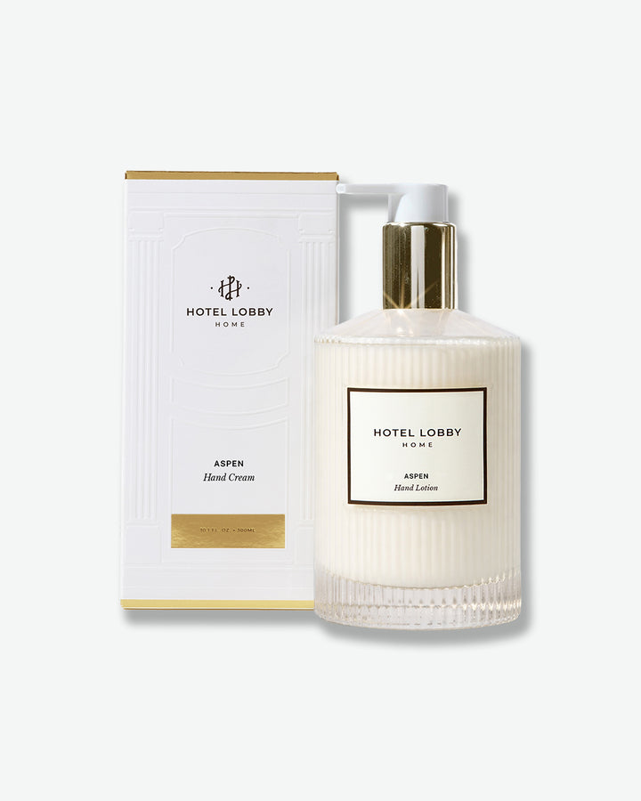 Hand lotion bottle and packaging with 'Hotel Lobby Home' branding on a white background