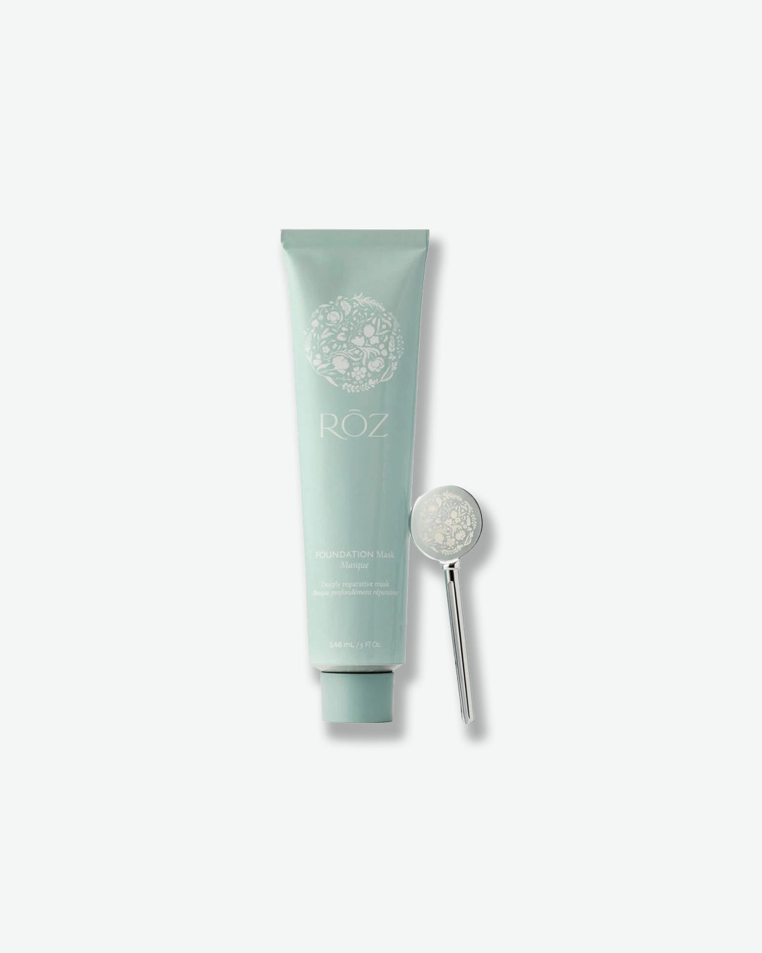 Skincare product with a spoon on a white background