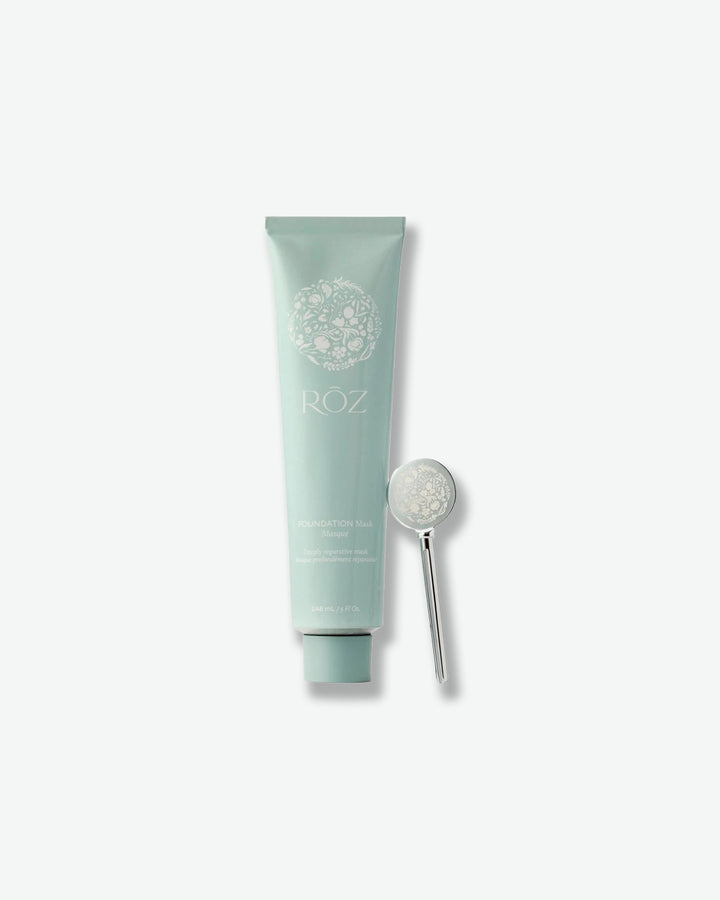 Skincare product with a spoon on a white background