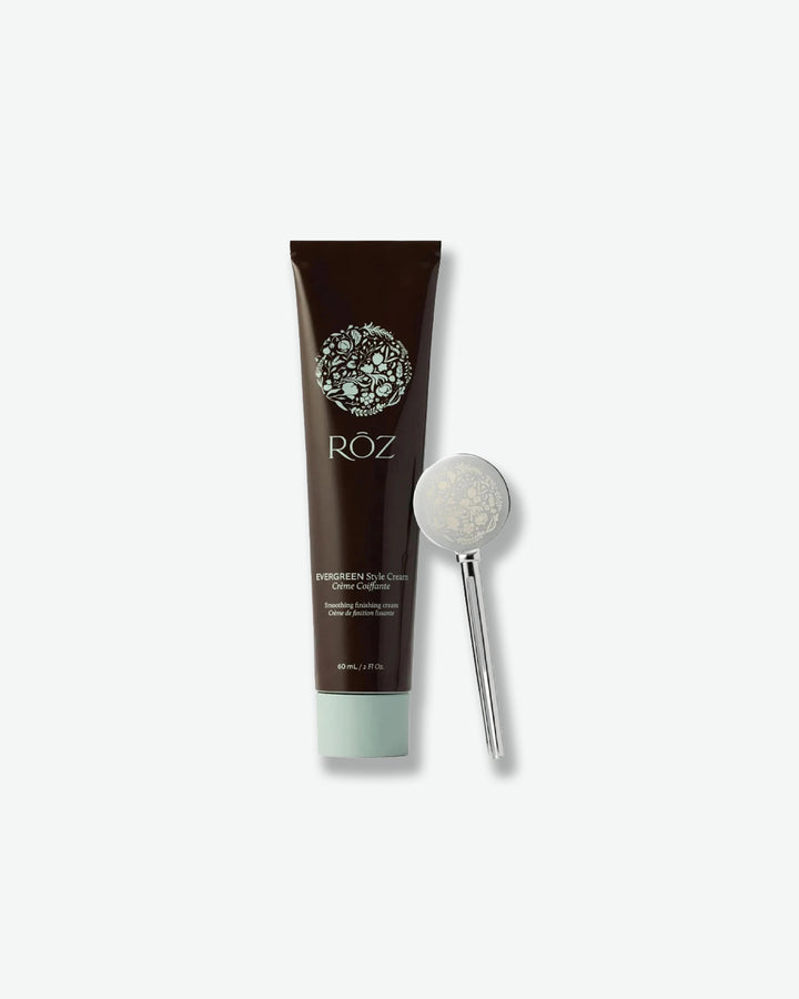 Tube of ROZ skincare product with a applicator on a white background
