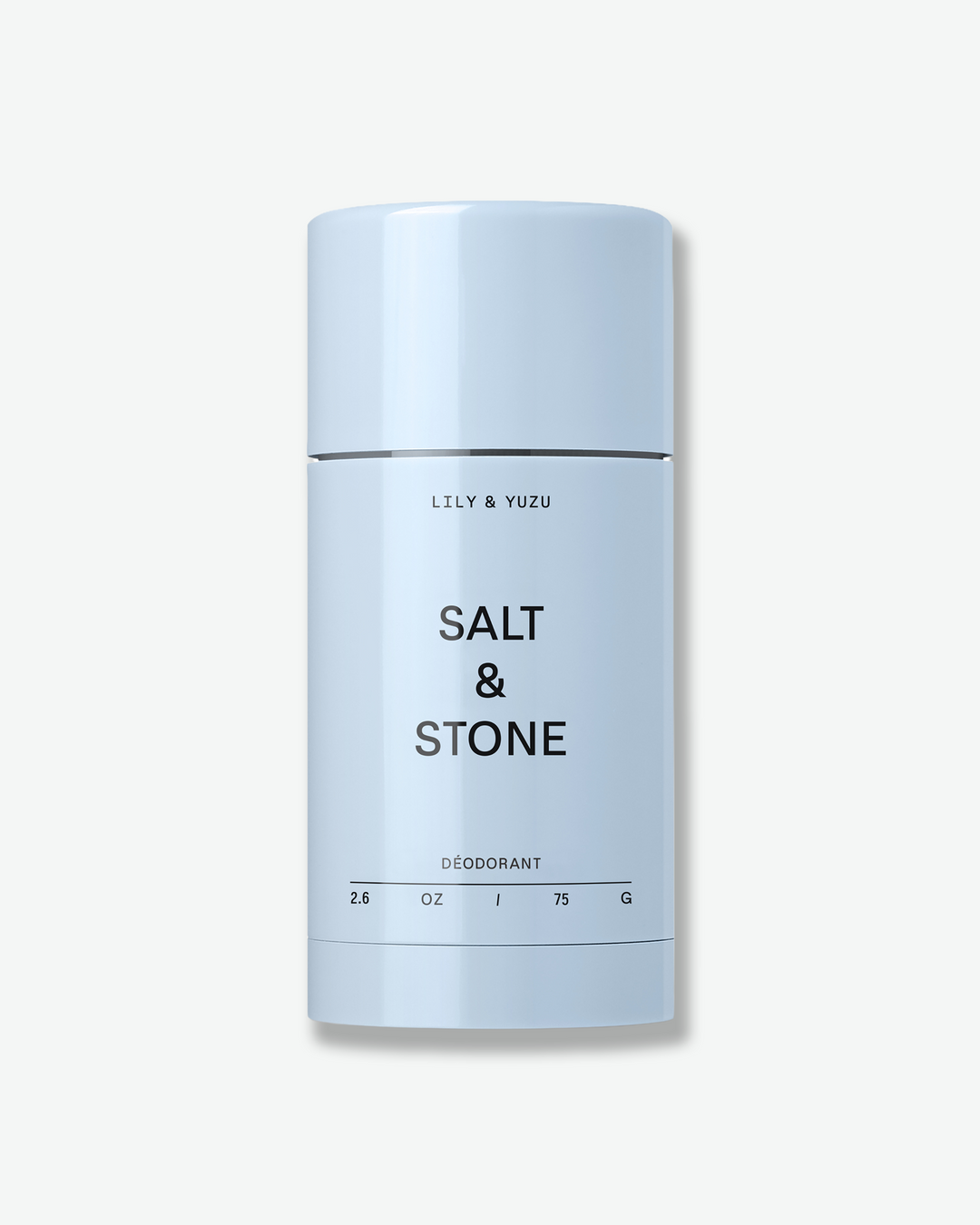 A light blue stick of Salt & Stone "Lily & Yuzu" deodorant against a white background.