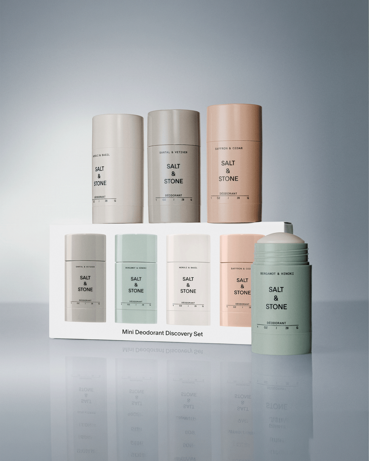 Salt & Stone Mini Deodorant Discovery Set box displayed with mini deodorant sticks arranged around and on top of it.