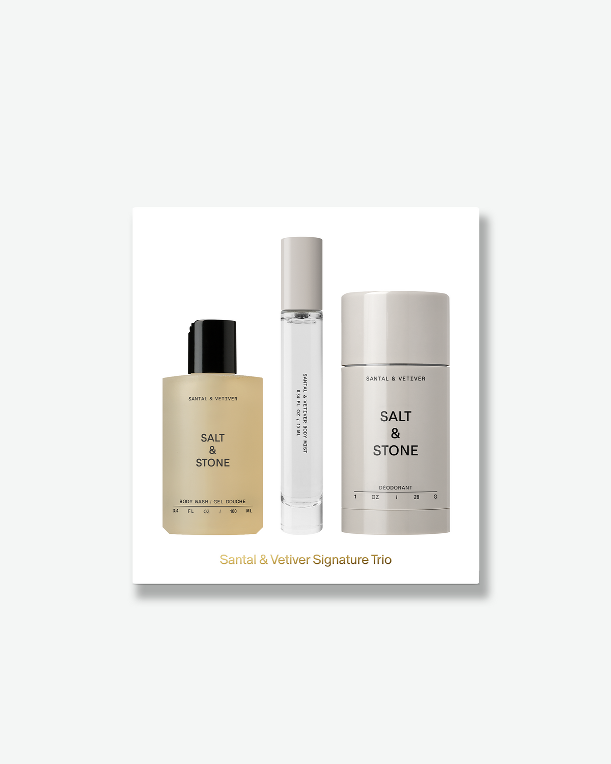 SALT & STONE Santal & Vetiver Signature Trio gift set featuring body wash, body mist, and deodorant displayed on a white gift box with gold lettering.